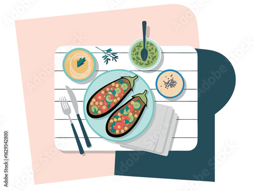 Overhead view of healthy stuffed eggplant with dips and cutlery hummus baba ghanoush