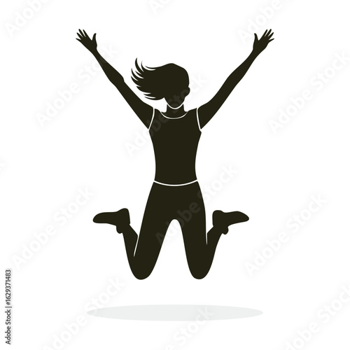 Woman jumping with joy celebrating success and happiness in a moment of pure exhilaration