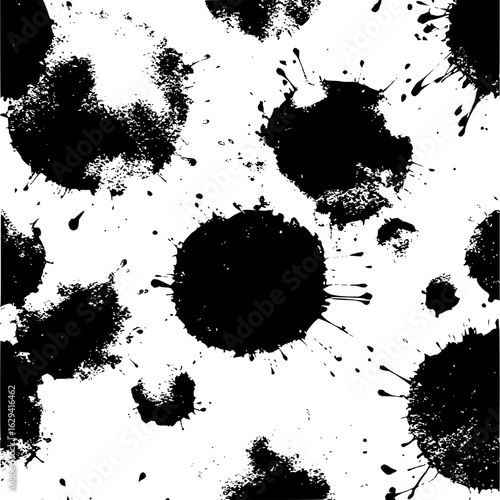 Monochrome seamless pattern of black ink blots and splatters on a white background creating abstract art