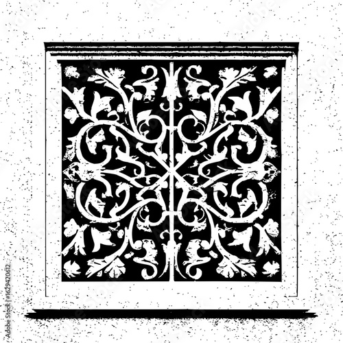 Ornate window with floral design in black and white showing intricate details and symmetrical pattern