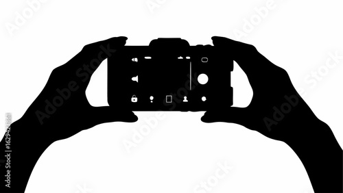 Silhouette of hands holding a smartphone with various icons displayed on the screen in black and white