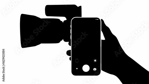 Silhouette of a hand holding a smartphone next to a camera with flash in black and white color scheme
