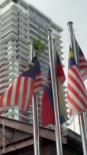 Malaysia, Kuala Lumpur, 24 November 2025 – the country's national flag, similar to the American flag. It flutters in the wind, a striped flag of Asia, a national treasure, a symbol of the country.