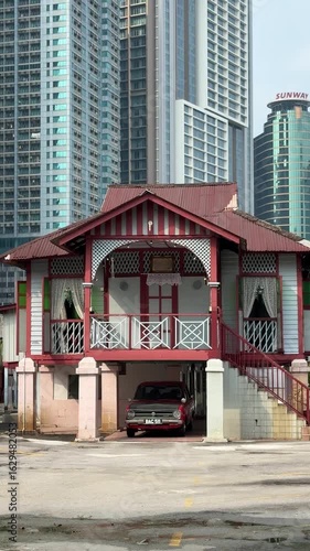 Malaysia, Kuala Lumpur, 24 November 2025 – urban infrastructure. Walking around the capital, skyscrapers, towers, Petronas, sights all around, large motorways, glass facade.