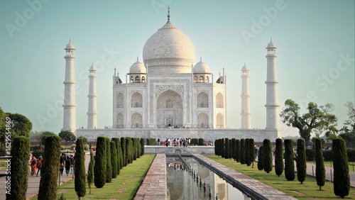 Iconic Taj Mahal Mausoleum with Symmetrical Reflecting Pool and Lush Garden, a UNESCO World Heritage Site in Agra, India
