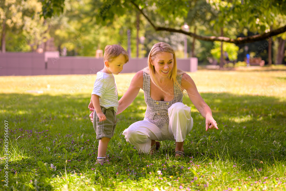 Fototapeta premium Blonde Woman With Young Child