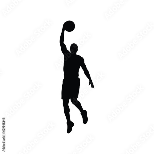 Silhouette of a basketball player in mid air dunking the ball isolated on white background