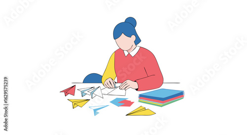 Creative crafting with colorful paper airplanes: An artist folds delicate paper models on a pristine white surface