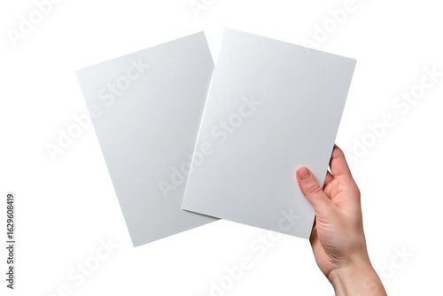 Two blank brochures held by a hand