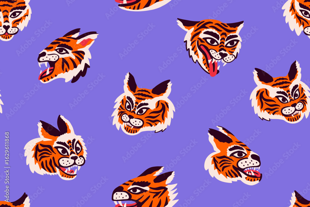 Obraz premium Stylish seamless pattern with roaring tiger heads. Vector illustration on violet background. Quirky hand drawn design. Colorful wild cast print for fabric design.