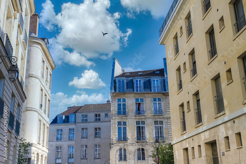 Fototapeta Naklejka Na Ścianę i Meble -  Paris, typical buildings in the Marais, rue Saint-Paul, in the center of the french capital
