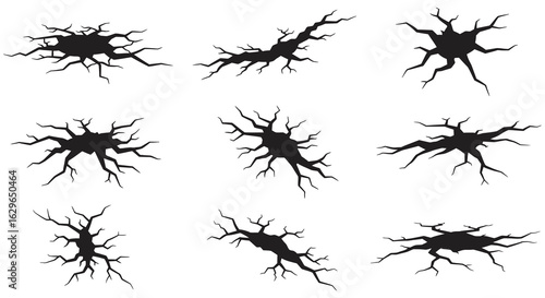 Collection of nine black abstract crack patterns on a white background representing damage and disruption