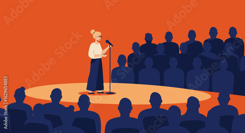 Woman speaking at a microphone on a stage in front of an audience