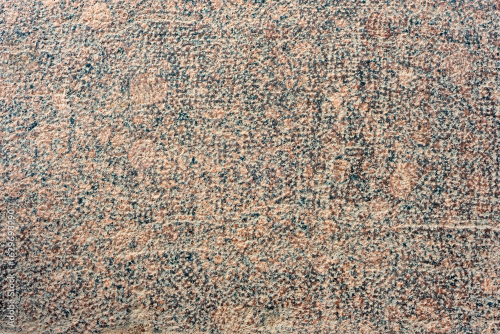 Fototapeta premium Texture of stone with yellow tint. Rock background. Stone