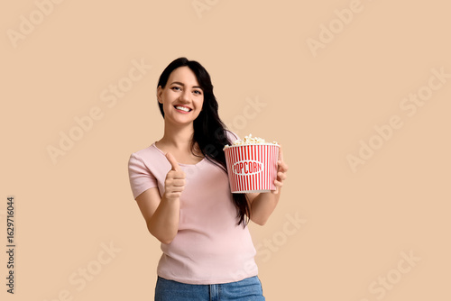 Happy young woman with buck...