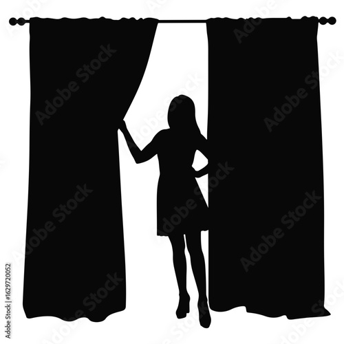 Woman closing curtains at night, creating a sense of privacy