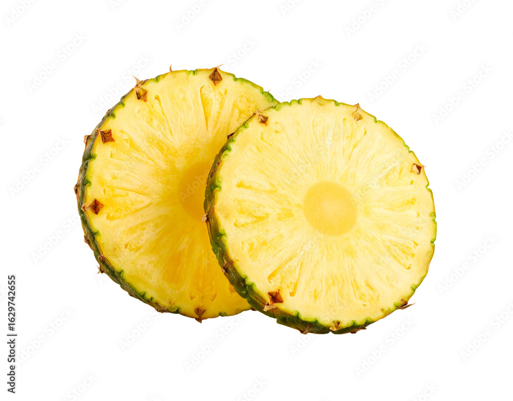 Two fresh round pineapple slices with juicy yellow flesh and green rind. Two fresh round pineapple slices with juicy yellow flesh and green rind.
