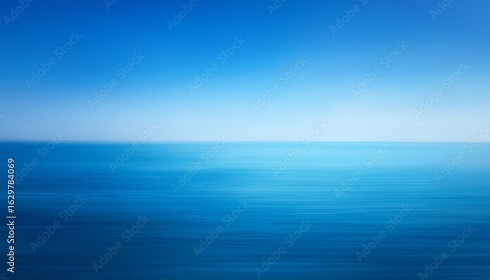 Obraz premium a blurry blue background the sky and water with a gradient that transitions from light blue to dark blue
