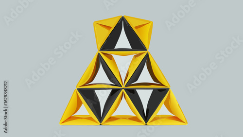 A pyramid structure composed of yellow and black triangular shapes arranged in a stacked formation
