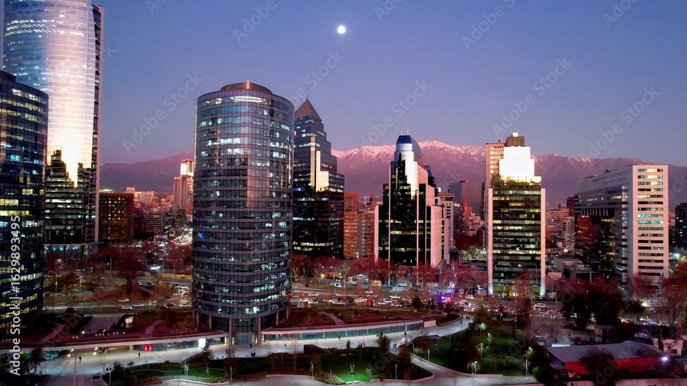 Fototapeta premium Sunset Santiago Skyline In Santiago Chile. Amazing Skysrapers And Traffic On Street Viewed From Above. Building Infrastructure Landscape High Rise Building Stunning. Infrastructure Urban.