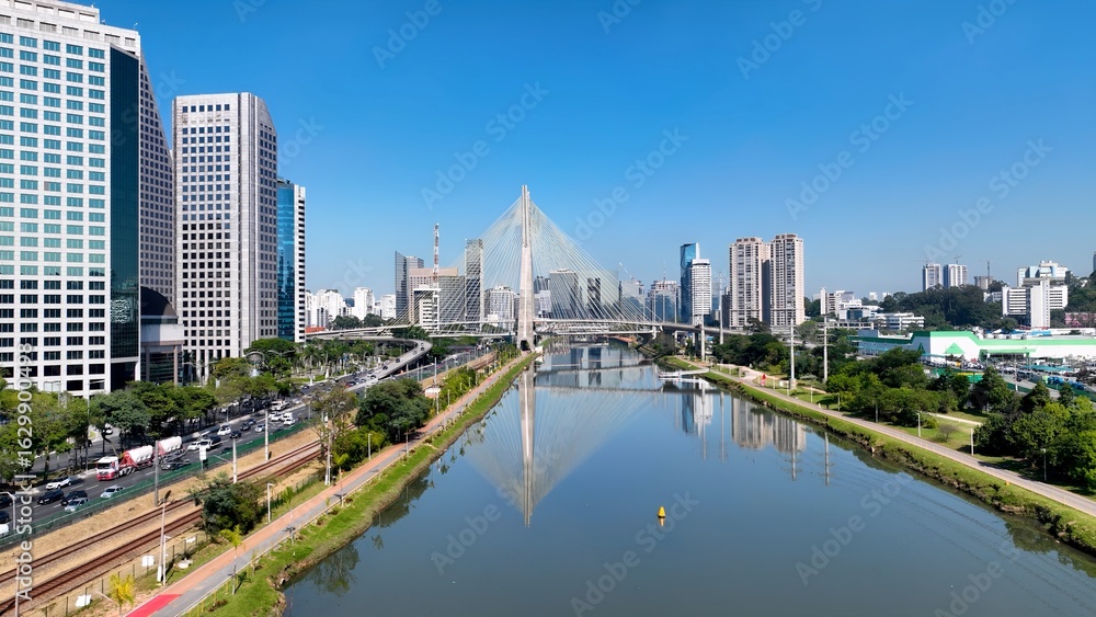 Fototapeta premium Cable Bridge In Downtown Sao Paulo Brazil. Cars Driving Towards Downtown City On The Famous Bridge. Business Sky Background Downtown Cityscape. Outdoor Downtown Panning Wide. Downtown Sao Paulo.