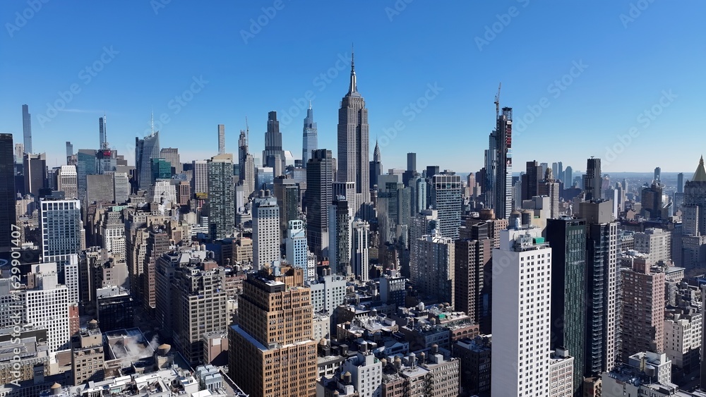 Fototapeta premium Empire State Building In Manhattan New York United States. Amazing Skysrapers And Traffic On Street Viewed From Above. Town Sky Clouds Backgrounds Urban. Town Panorama. Manhattan New York.