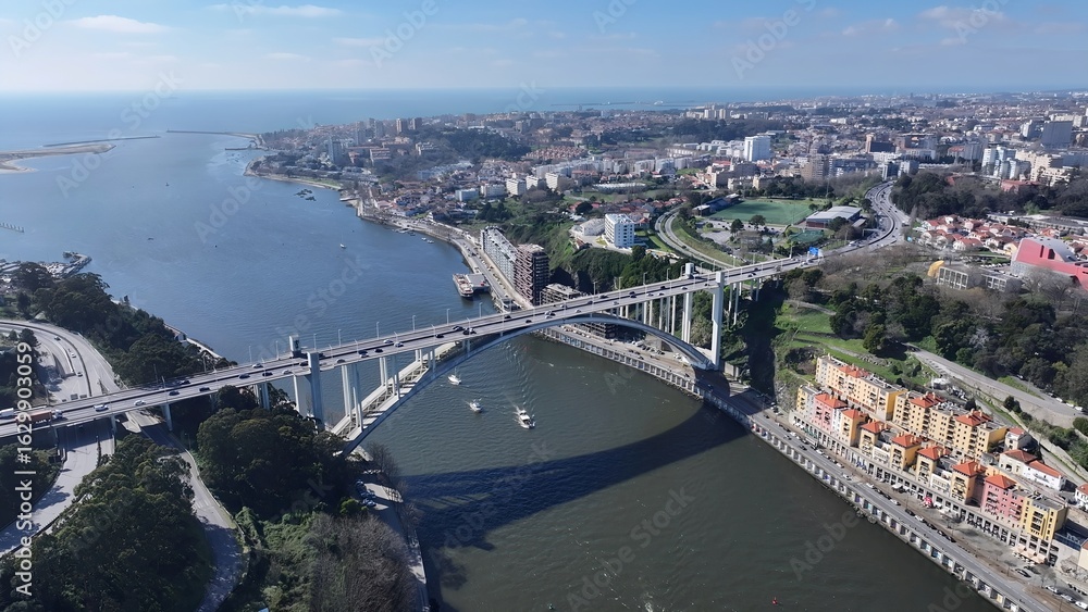 Naklejka premium Porto Skyline In Porto Portugal. Aerial View Of A Bustling Downtown Cityscape With Modern Buildings. Metropole Landscape Company Building Vibrant. Metropole Corporate Town. Porto Portugal.