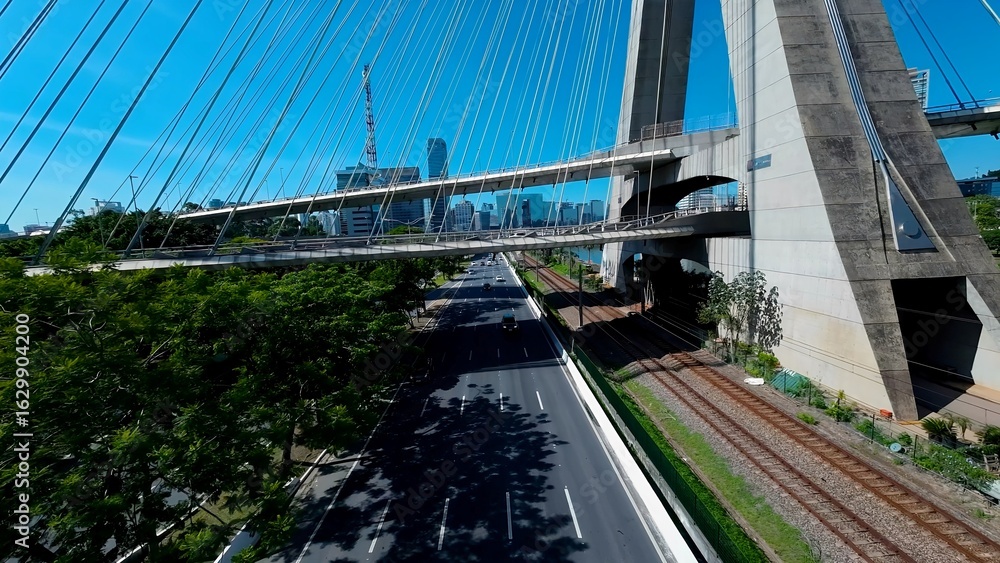 Obraz premium Cable Bridge In Downtown Sao Paulo Brazil. Traffic Is Moving Across A Modern Cable-Stayed Bridge. Industrial Landscape Buildings Stunning. Urban Buildings Town. Downtown Sao Paulo.