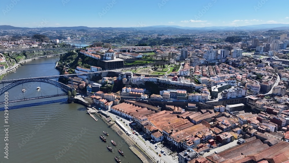 Obraz premium Morro Garden In Gaia District Of Porto Portugal. Drone Captures A Garden With Sidewalks Surrounded By Lush Trees. Industry Skyline Commercial Building Awesome.