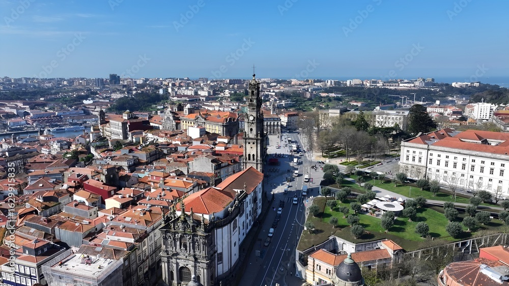 Fototapeta premium Clerigos Tower In Porto Portugal. Medieval Building In A Bustling City Viewed From Above. Metropolitan Skyline Panoramic City View Stunning. Metropolitan Architecture Business. Porto Portugal.