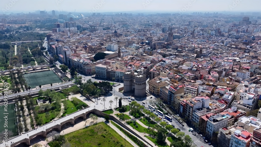 Fototapeta premium Serranos Towers In Valencia Spain. Birds Eye View Of Stunning Cityscape With Streets And Buildings. Business Sky Downtown Cityscape. Business Panning Wide. Valencia Spain.