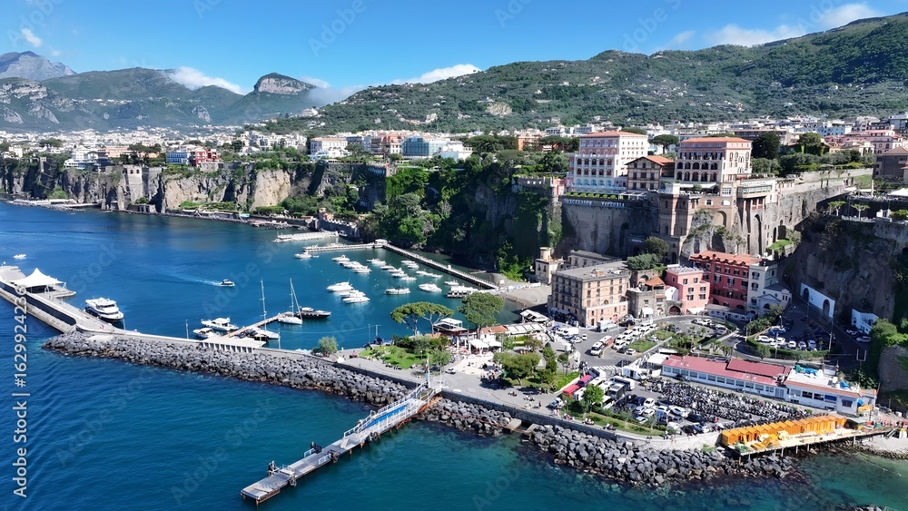 Fototapeta premium Sorrento Coast In Sorrento Naples Italy. Breathtaking Aerial View Of A Lush Tropical Coastline Scenery. Coast Horizon Seaside Summertime. Coast Outdoors Panoramic. Sorrento Naples.