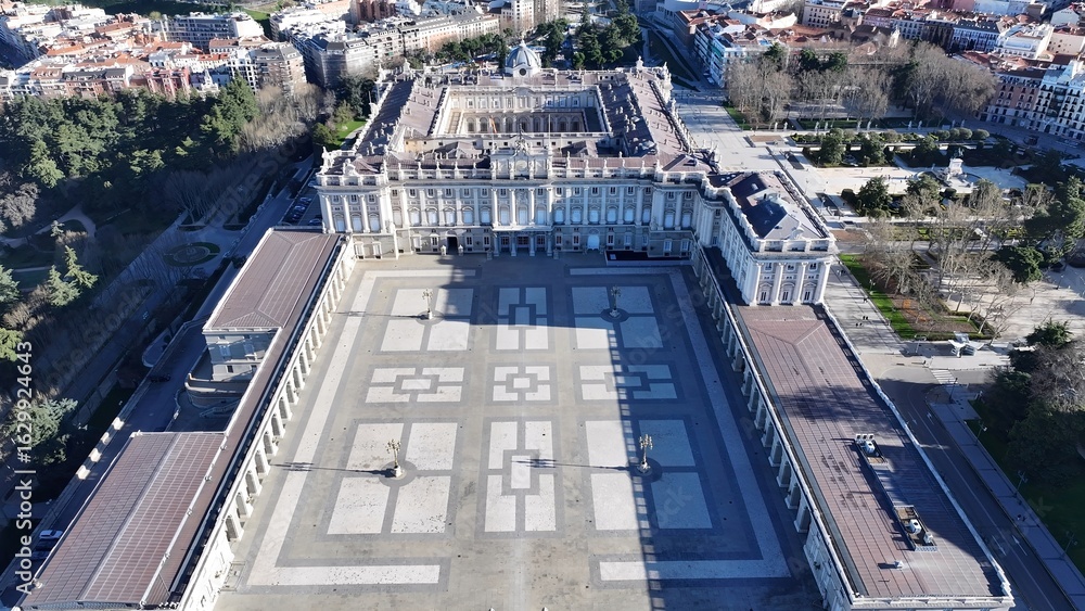 Fototapeta premium Royal Palace Of Madrid In Madrid Spain. Aerial View Of A Bustling Downtown Cityscape With Modern Buildings. Town Sky Backgrounds Urban. Outside Backgrounds Up Above. Madrid Spain.