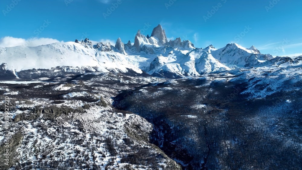Obraz premium Fitz Roy Valley In El Chalten Patagonia Argentina. Stunning View Of Icebergs Breaking Off Into The Water . Snowy Lake Patagonia Landscape Exploring. Patagonia Landscape. El Chalten Patagonia.