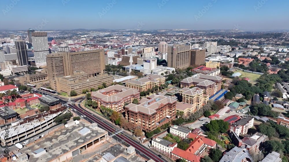 Obraz premium Johannesburg Skyline In Johannesburg Gauteng South Africa. Capturing The Hustle And Bustle Of A Vibrant City From Above. Infrastructure Landscape Company Building Stunning.
