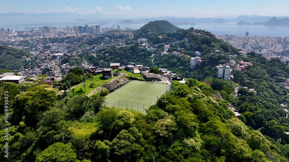 Obraz premium Favela Tour In Rio De Janeiro Brazil. Stunning Favela Landscape In A Mountain In A Famous City. Business Clouds Sky Downtown Cityscape. Backgrounds Panoramic. Rio de Janeiro Brazil.