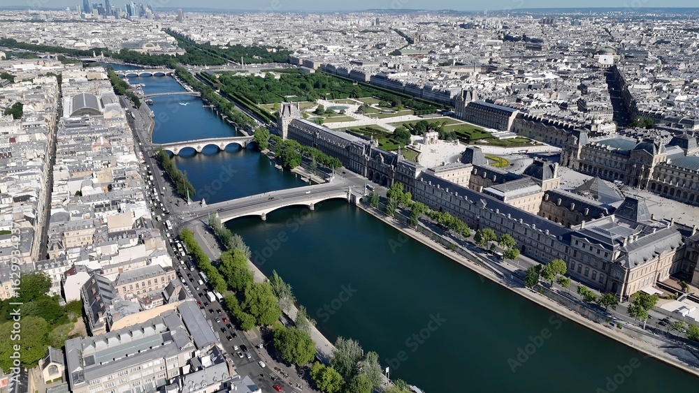 Fototapeta premium Louvre Museum In Paris Ile De France France. Bird Eye View Of Famous Building In Vibrant District Of City. Business Clouds Sky Downtown Cityscape. Backgrounds Panoramic. Paris ile de france.