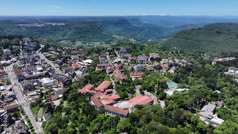 Obraz premium Gramado Skyline In Gramado Rio Grande Do Sul Brazil. Aerial View Of A High-Rise Buildings And Traffic Showcasing Urban Life. Town Sky Clouds Backgrounds Urban. Town Panorama.