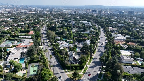 Beverly Hills In Los Angeles California United States. Aerial View Of A Bustling City With High-Rise Buildings And Traffic. Town Sky Clouds Backgrounds Urban. Town Outdoor Downtown Panning Wide.