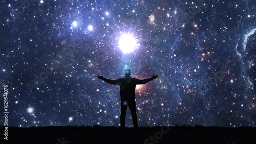 Wallpaper Mural A man stands with arms wide open under a star-filled night sky, embracing the vastness of the universe. A bright celestial light shines above, symbolizing wonder, connection, and cosmic exploration. Torontodigital.ca