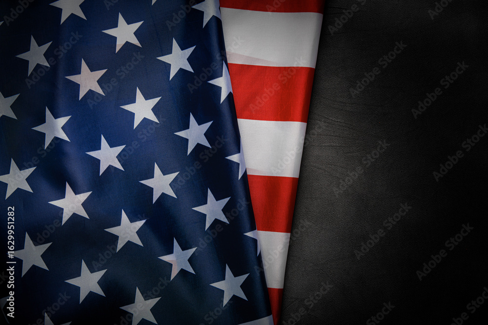 Fototapeta premium American flag with stars and stripes on a dark textured background
