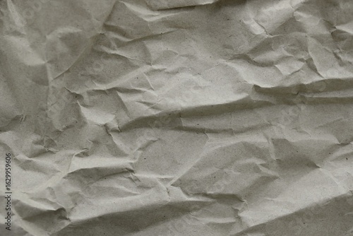Brown crumpled recycled paper texture background. Kraft Paper