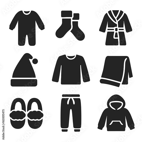Cozy Kidswear Icons. Solid, filled icons set of cozy indoor outfits for kids: fleece pajamas, slipper socks,