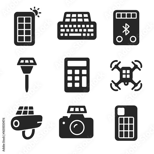 Eco Tech Icons. Solid, filled icons set of eco-friendly tech accessories: solar power bank, solar keyboard,
