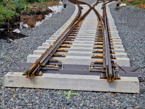 Fotografie A track switch allows trains to cross from one track to another