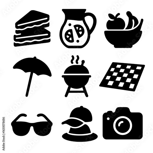 Picnic Essentials Icons. Solid, filled icons set of group picnic items: sandwiches, lemonade pitcher, fruit