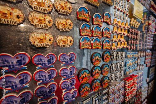 Fotografie Colorful fridge magnets featuring landmarks of Krakow, Poland displayed on a met