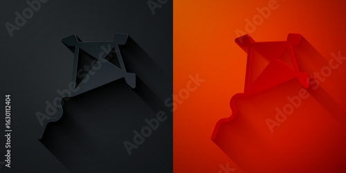Paper cut Kite icon isolated on black and red background. Paper art style. Vector
