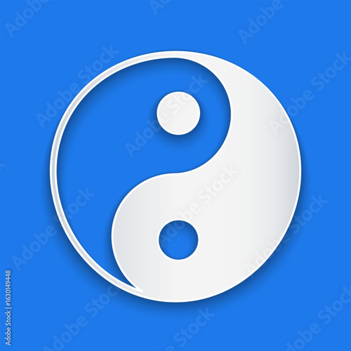Paper cut Yin Yang symbol of harmony and balance icon isolated on blue background. Paper art style. Vector