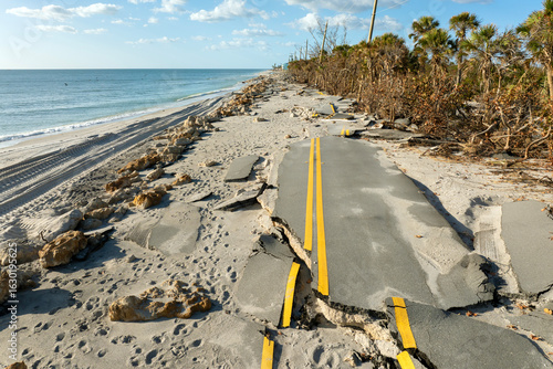 Wall Mural Destroyed Manasota Key road at Blind Pass Beach after Hurricane Milton storm surge